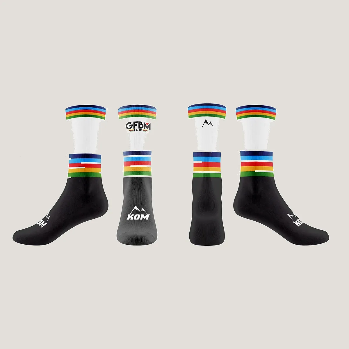 Official 2026-edition socks in white and black, with rainbow bands and the GFBM LA 10 logo, in four views